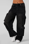 W231 - Drift Cargo Jeans - Oversized streetwear jeans with unique cargo pockets and hidden waistband adjusters for a customizable fit. Tall-friendly with an elongated inseam. Perfect with sneakers or heels for effortless style in Black Wash.