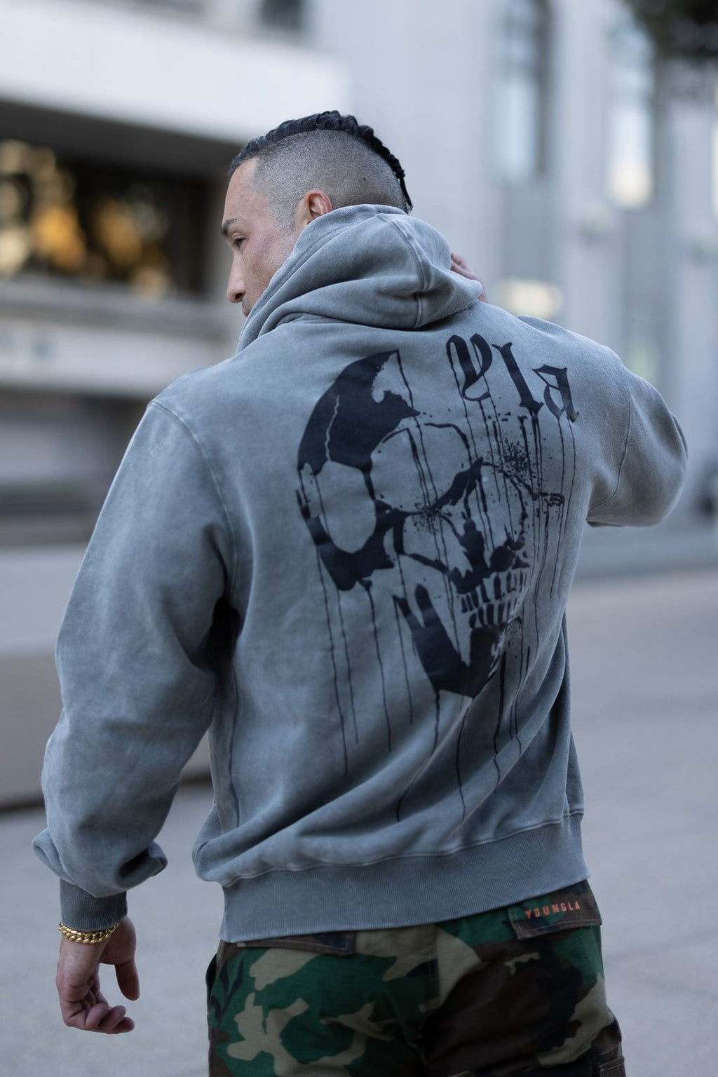 551 - Sweat à capuche Tête de mort coulante