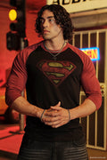 8072 - Superman 3/4 Raglan Shirts - Superman 3/4 Raglan Shirt – Lightweight 150 GSM fabric, soft & breathable, modern fitted cut. Features vintage Superman logo and contrast sleeves for a classic throwback style in Black/Red.