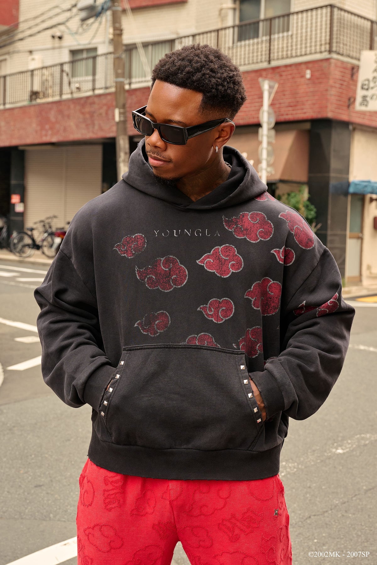 5083 - Sweat à capuche Naruto Stud Artwork
